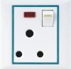 a switch with a three pole round socket &lamp