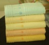 solid border bath towel with EMBD