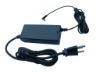 Switching power supply, power adaptor with grounded American plug