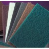 Abrasive no-woven scrubbing pad