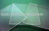 Low-iron textured toughened solar glass