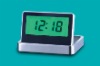 Sound / vibration controlled color changing clock